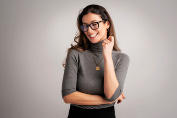 Atttractive middle aged woman wearing casual clothes and eyewear against isolated background