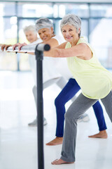 Canvas Print - Fitness is a lifestyle. Shot of three senior women working out indoors.