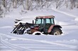 Hovden, Norway, February 21, 2023. Tractor half buried in the snow. 