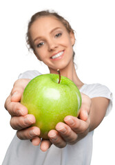 Wall Mural - Closeup of a Young Woman Holding an Apple