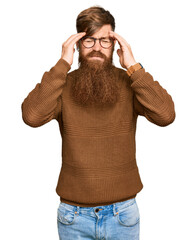 Poster - Young irish redhead man wearing casual clothes and glasses with hand on head, headache because stress. suffering migraine.