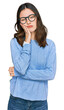 © Krakenimages.com - Young beautiful woman wearing casual clothes and glasses thinking looking tired and bored with depression problems with crossed arms.