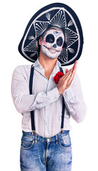 Poster - Man wearing day of the dead costume over background clapping and applauding happy and joyful, smiling proud hands together