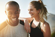 © Donson/peopleimages.com - Fit couple relationship goals. Shot of a fit young couple working out together outdoors.