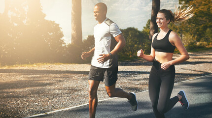 Aufkleber - Workout buddies are great for helping you stay on track. Shot of a fit young couple going for a run outdoors.