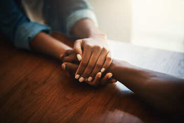 Wall Mural - I promise itll get better. Closeup shot of two people holding hands in comfort.