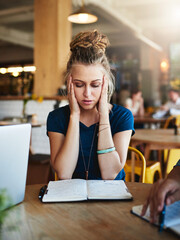 Poster - Dont leave anything to the last minute.... Cropped shot of a young student looking stressed while studying in a cafe.