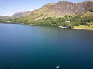 Wall Mural - Aerial view of a beautiful lake and small beach in a rural valley (Buttermere, Lake District, England)