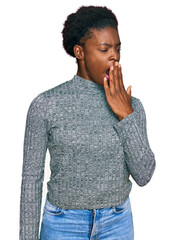 Wall Mural - Young african american girl wearing casual clothes bored yawning tired covering mouth with hand. restless and sleepiness.