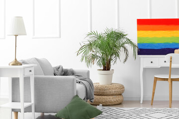 Poster - Interior of light living room with rainbow painting and table