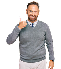 Sticker - Handsome middle age man wearing business clothes doing happy thumbs up gesture with hand. approving expression looking at the camera showing success.