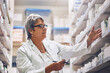 © N Hiraman/peopleimages.com - Helping patients to maintain and optimize their health. Shot of a pharmacist at work.
