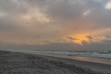 Wall Mural - Colors in the Clouds, Sunrise over Beach and Sea