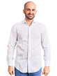 © Krakenimages.com - Young handsome man wearing elegant shirt looking positive and happy standing and smiling with a confident smile showing teeth