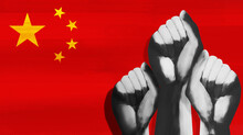 Multiple Clenched Fists Against Chinese Flag Behind Them. Protest In China. Protest For China