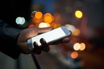 Sticker - Business info whenever he needs it. Cropped shot of a businessman using a digital tablet at night.