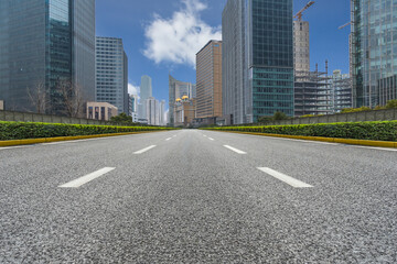 Wall Mural - city road through modern buildings in beijing.