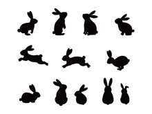 Set Of Silhouettes Of Rabbits In Various Poses.