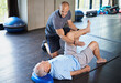 © Yuri A/peopleimages.com - Rehabilitation can be tough going. Cropped shot of a handsome personal trainer with a senior man.