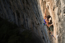 Female Rock Climber During Ascent At El Salto Climbing Area, Nuevo Leon, Mexico