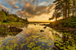 © Cavan Images - Long Lake camping trip during sunset on the lake, New York