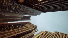 Vertical Format Of Looking Directly Up At The Skyline Of The Financial District