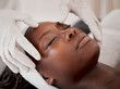 © T Mdlungu/peopleimages.com - Black woman, face and sleeping in spa facial for beauty skincare, massage or relaxing in treatment. Calm African American female dreaming in luxury physical therapy, zen or relaxation at salon resort
