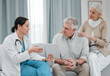 © Mumtaaz D/peopleimages.com - Nurse with tablet results consulting old couple in hospital after surgery or medical test report for support. News, healthcare clinic or doctor working or helping a depressed or sick elderly person