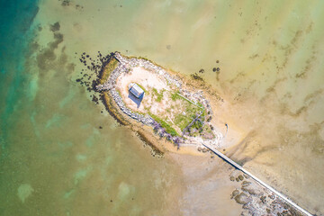 Wall Mural - Small island church in lagoon near Posedarje aerial view