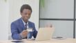 © stockbakers - African Businessman Unable to make Online Payment on Laptop