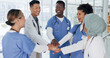 © D Lahoud/peopleimages.com - Doctor, hands or stack in teamwork motivation, collaboration or cheering in healthcare, wellness or life insurance. Smile, happy or clapping medical people in success, diversity or celebration circle