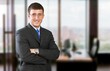© BillionPhotos.com - Smiling young business man employer in office