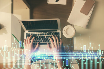 Fototapete - Double exposure of woman hands working on computer and data theme hologram drawing. Top View. Technology concept.