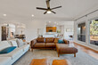 © Allison - clean living room with leather couches