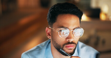 Night, reflection and glasses of businessman at computer for digital, software and web design programming. Strategy, designer and coding with employee in office and overtime for cybersecurity network