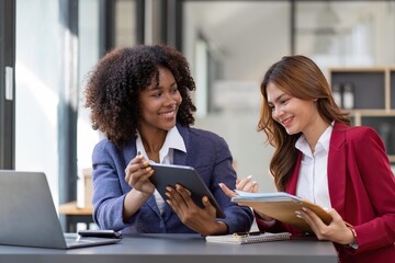 Wall Mural - Teamwork of business people analysis graph Asian business woman advisor meeting to analyze and discuss on the financial report