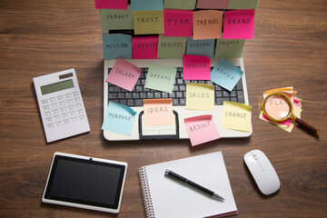 Sticker - Laptop computer with colorful sticky notes. Business