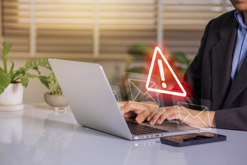 Fototapete - Businessman using laptop with electronic email hacking and spam warning symbol. cyber attack network, virus, spyware, Cyber security and cybercrime.