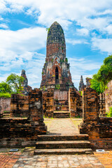 Ruins of ancient city and temples Ayutthaya, Thailand. Old kingdom of Siam. Summer day with blue sky. Famous tourist destination, spiritual place near Bangkok.