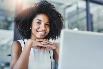 Wall Mural - The woman with the business plan. Cropped shot of an attractive young businesswoman in her office.