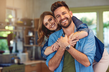 Canvas Print - Nothing says home like unconditional love. Portrait of a happy young couple embracing at home.