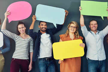 Aufkleber - Well be your voice. Studio shot of a diverse group of people holding up speech bubbles against a gray background.