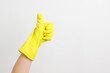 Woman in Yellow Rubber Gloves Showing Thumbs-Up Gesture