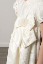 Details Of White Satin Lace Braidsmaid Dress. Flower Girl Goan With Large Fabric Bow. Vertical