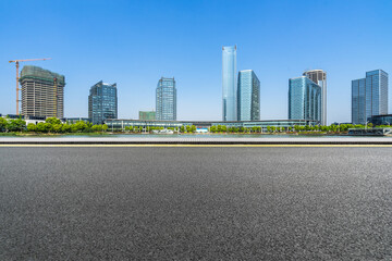 Wall Mural - urban traffic road with cityscape in background, China.