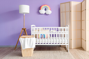 Canvas Print - Interior of children's bedroom with crib, basket and lamp