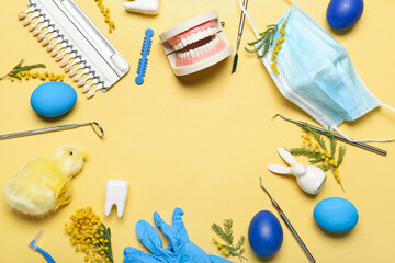 Wall Mural - Frame made of dentist's tools, Easter eggs, chicken and flowers on yellow background