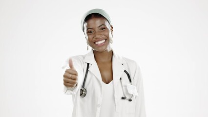 Sticker - Black woman, doctor and thumbs up in studio portrait studio, smile isolated on white background. Healthcare, happiness and trust, medical professional in agreement and happy to help in health care.