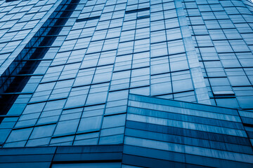 Canvas Print - Urban abstract - windowed corner of office building.