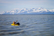© Cavan Images - Man packrafting in Alaska